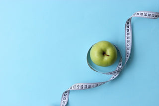 Apfel mit Maßband